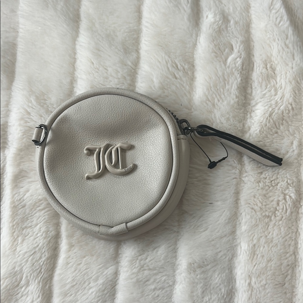 Juicy Couture Cream Round Wristlet
